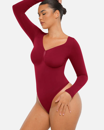 Novelia™ Sculpt – tvarující body s dlouhým rukávem a tanga střihem